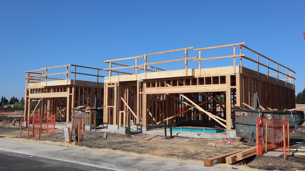 New residential construction with wooden framing in Elk Grove, California.