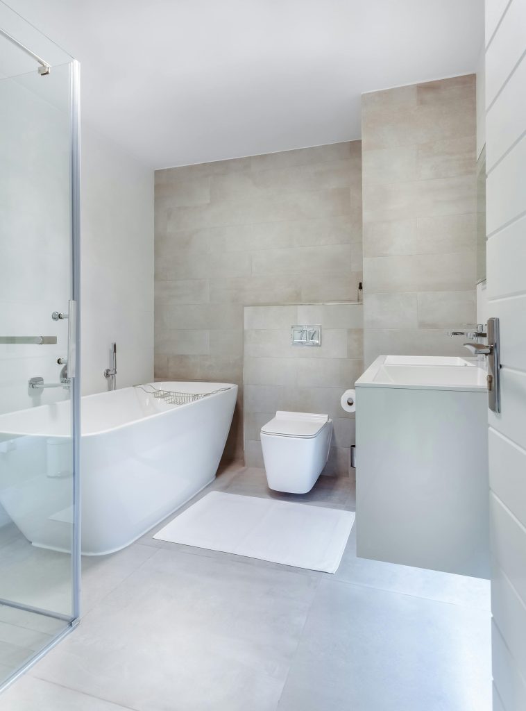 pexels photo 1457847 1457847 Elegant minimalistic bathroom featuring bathtub and sleek fixtures.